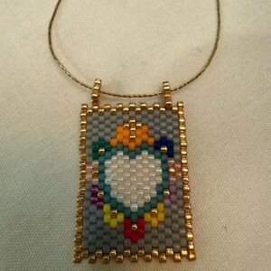 Beaded Pendant Necklace Chain length
adjustable 16-18